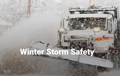 Winter storm safety. A snow plow surrounded by snow.